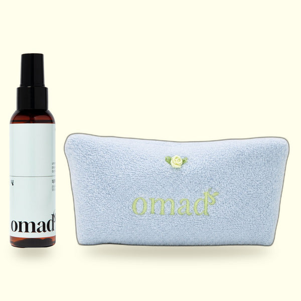 Duo Blonde Voyageuse : le spray éclaircissant et la trousse de toilette OMAD'S