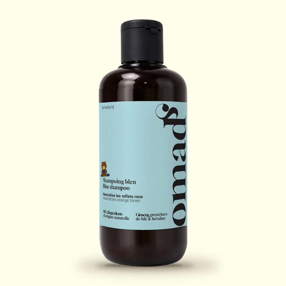 Un flacon de Shampoing bleu OMAD'S 250 ml