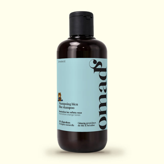 Un flacon de Shampoing bleu OMAD'S 250 ml
